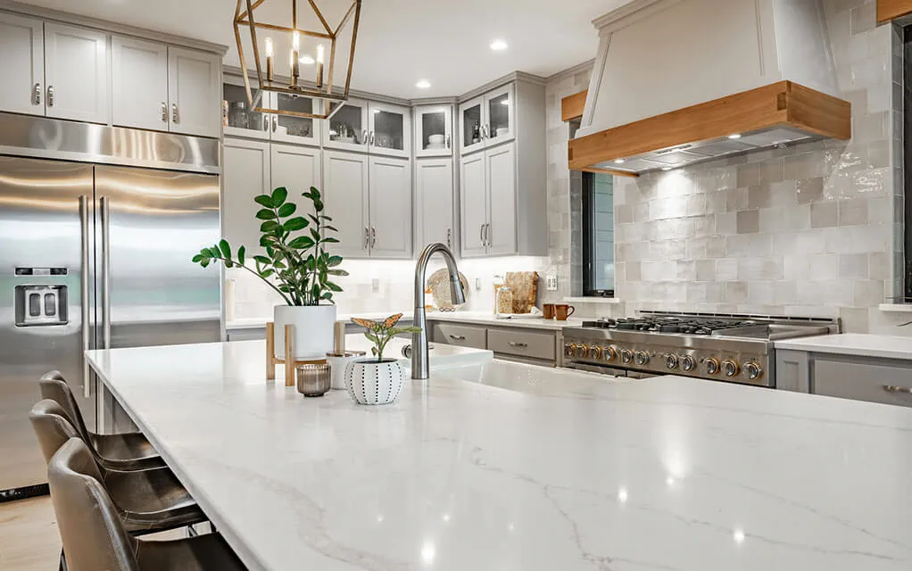 View of an upscale and nice looking kitchen with bright and vibrant lighting throughout