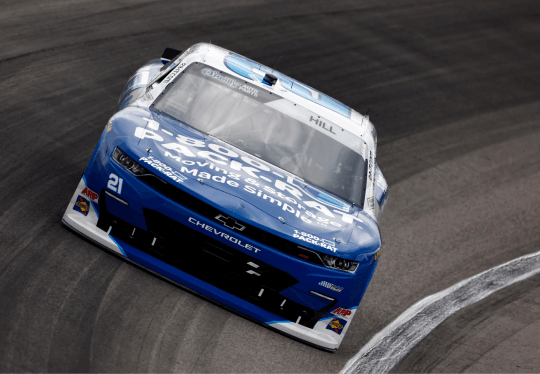 Austin Hill hugging the turn