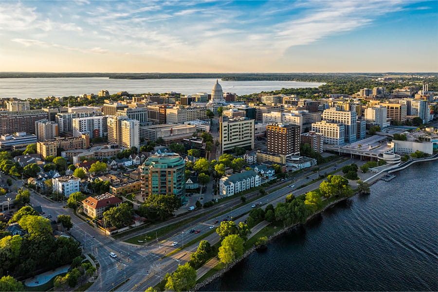 An aerial view of downtown Madison, WI on a bright and sunny morning